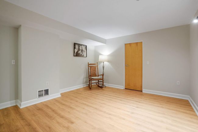 Master bedroom with bath, located off the kitchen and 'Right Wing' of unit | Image 20