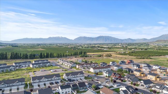 Aerial perspective of suburban area featuring a mountainous background | Image 39