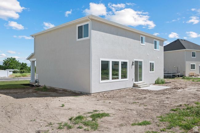 Back of property with entry steps and stucco siding | Image 30