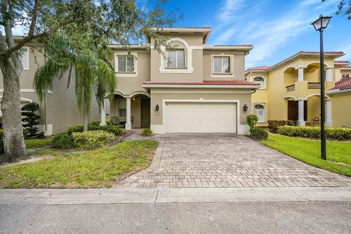 1002 Center Stone Ln, Riviera Beach, FL, 33404-1823 | Card Image