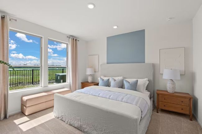 Photo of Pulte model home with same floor plan, not of actual home listed. | Image 7