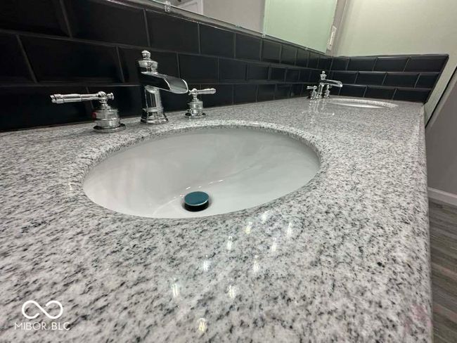 Double sinks, granite vanity. | Image 17