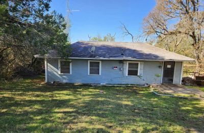 Rear view of property with a lawn | Image 1