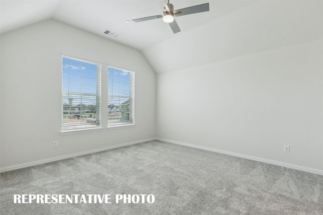 This peaceful light filled owner's bedroom is the perfect place to relax after a long day. REPRESENTATIVE PHOTO | Image 9