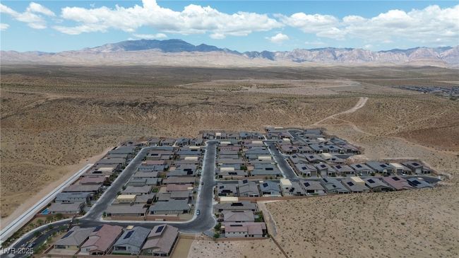 View of property location featuring nearby suburban area, a mountain backdrop, and a desert landscape | Image 43