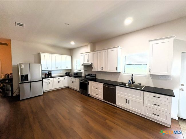 4748 Battle Lake Rd, Home with 4 bedrooms, 2 bathrooms and null parking in Mart TX | Image 4