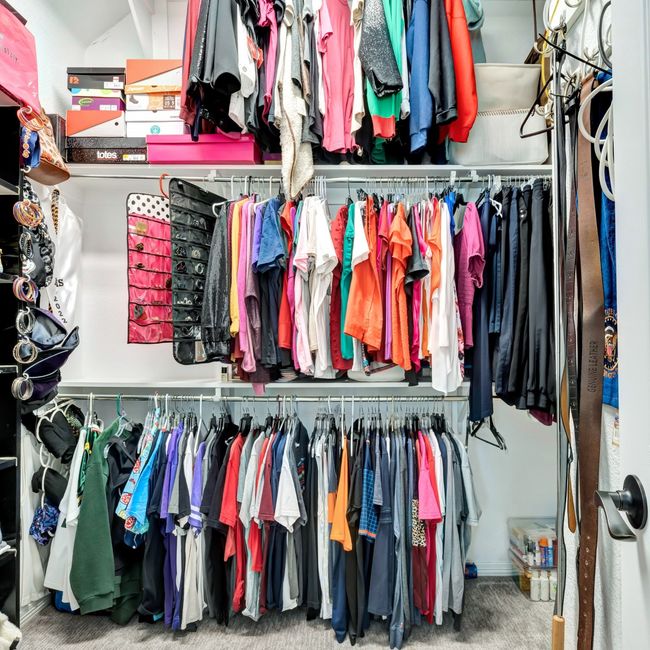 Walk in closet with carpet floors | Image 26