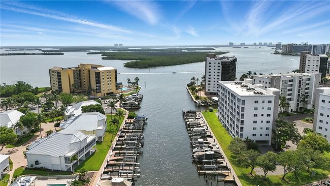 View of urban area featuring a large body of water | Image 5