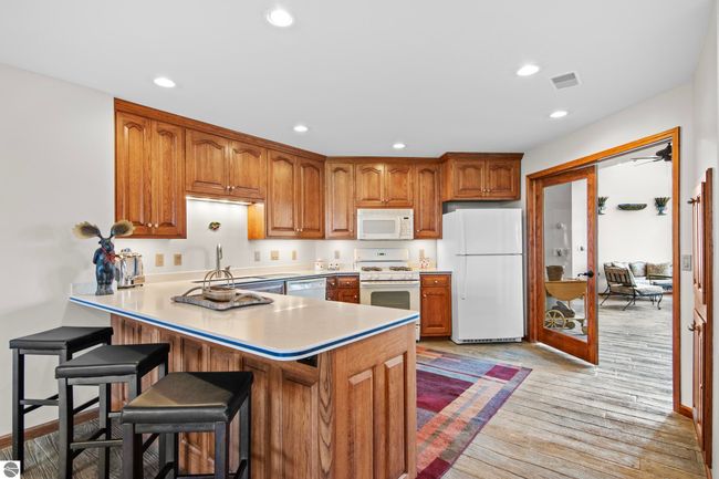 4173 Dornoch Ct, House other with 6 bedrooms, 4 bathrooms and null parking in Williamsburg MI | Image 37