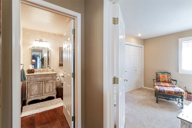 Bathroom with vanity and wood finished floors | Image 26