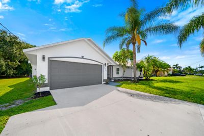 3240 Se West Snow Road, House other with 4 bedrooms, 2 bathrooms and null parking in Port St Lucie FL | Image 2