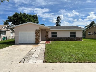 7614 Sw 8th Ct, House other with 3 bedrooms, 2 bathrooms and null parking in North Lauderdale FL | Image 1