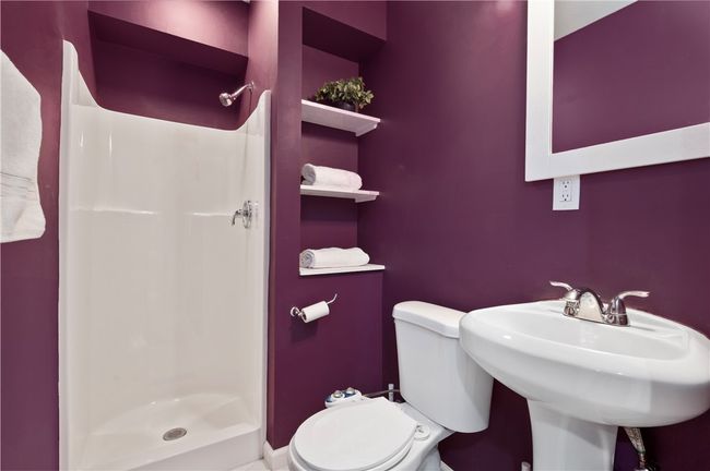 The basement includes a full bath. | Image 25