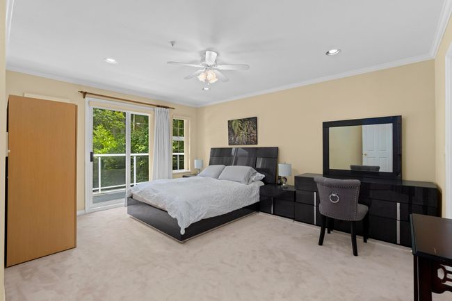 Bedroom featuring carpet, access to outside, crown molding, ceiling fan, and recessed lighting | Image 18
