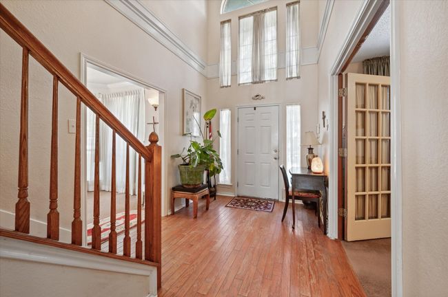 Light and bright entryway offers a beautiful entrance into your home. To the right in this photo is the private office and to the left are the formal living and formal dining spaces. | Image 18