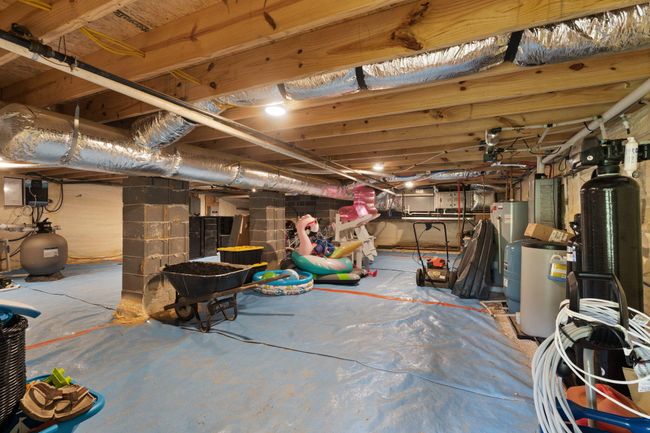 Walk-in Crawl Space with electrical outlets, lighting, and insulated foam sprayed walls | Image 99