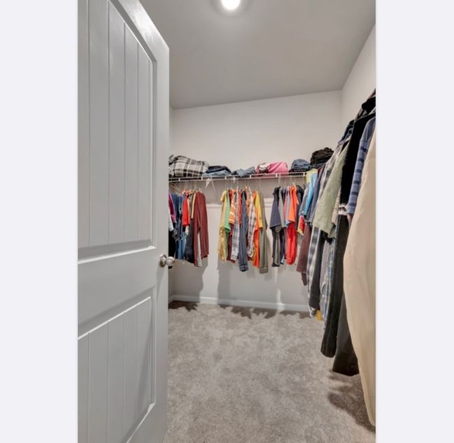 Large walk in closet inside primary bathroom | Image 17