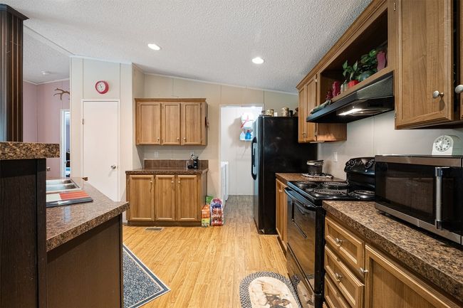 floors, and dark countertops | Image 13