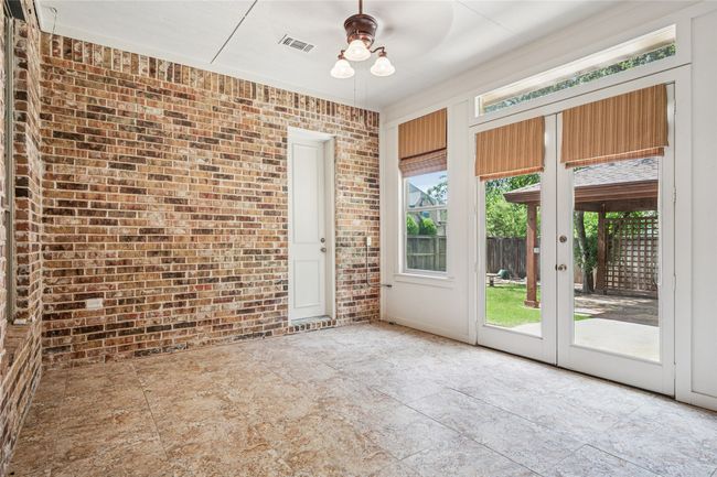 Sun room overlooking backyard. Fully cooled and heater for all year round enjoyment. | Image 33