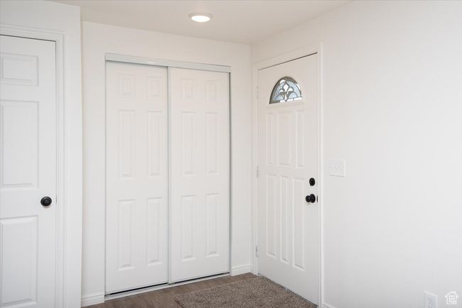 Entrance foyer with baseboards and dark wood-style floors | Image 5