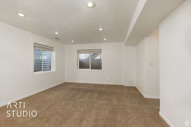 Spare room with carpet floors and recessed lighting | Image 17