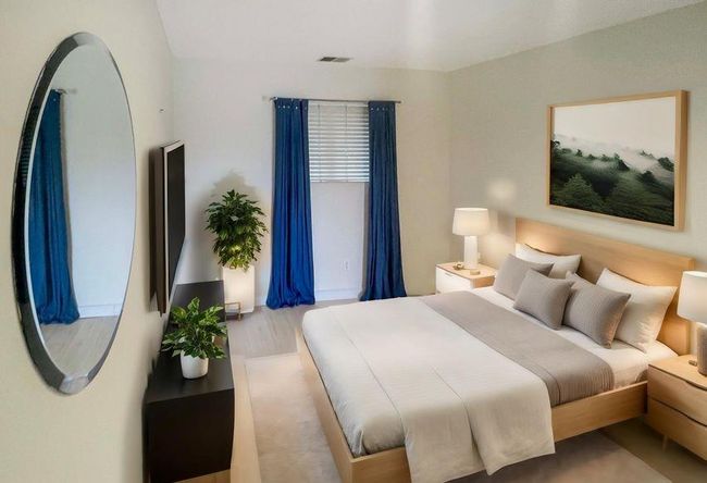 Bedroom featuring visible vents and wood finished floors | Image 16