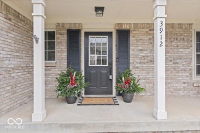 Welcome home to large brick front porch | Image 2