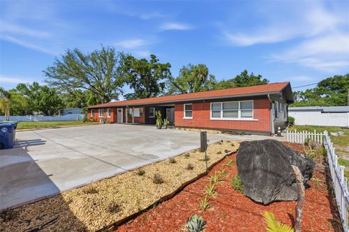 10107 N Aster Ave, TAMPA, FL, 33612-6945 | Card Image