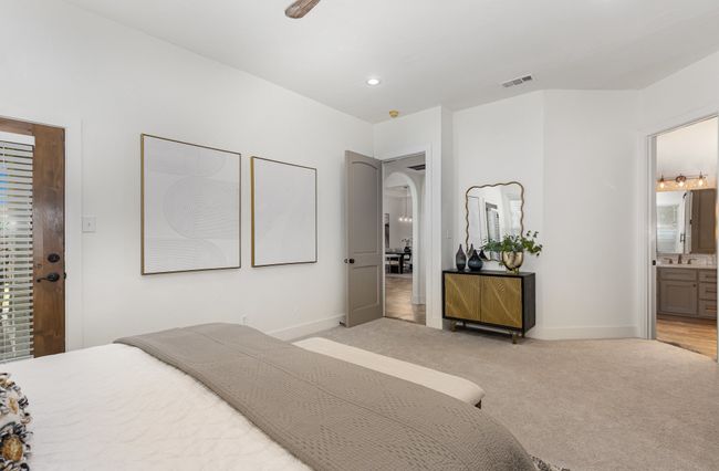 Bedroom featuring light carpet, recessed lighting, and ensuite bath | Image 17