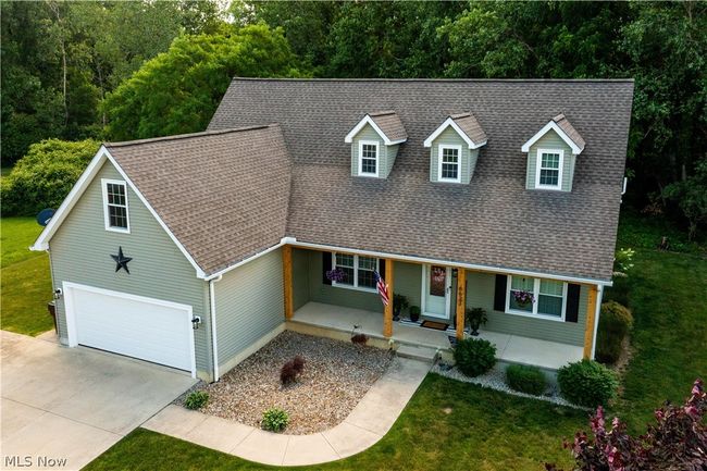 Cape cod house with a garage | Image 45