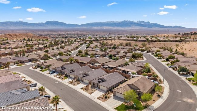 Aerial view of residential area featuring a mountain backdrop | Image 67