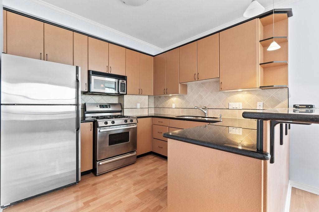201 - 1725 Balsam Street, Condo with 2 bedrooms, 2 bathrooms and 2 parking in Vancouver BC | Image 2