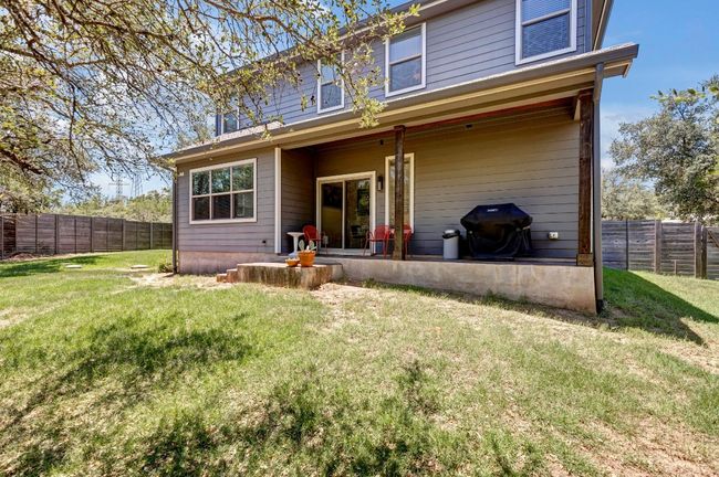 Back of property with a fenced backyard | Image 26