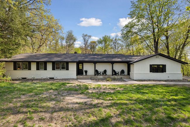 This home sits on 2.17 acres and is conveniently located just down the street from a walking path that goes around Pleasant Lake. | Image 40