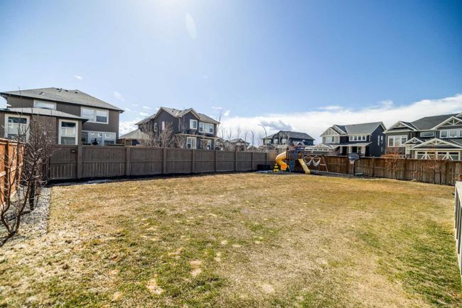 556 Boulder Creek Bay Se, Home with 3 bedrooms, 2 bathrooms and 4 parking in Langdon AB | Image 36