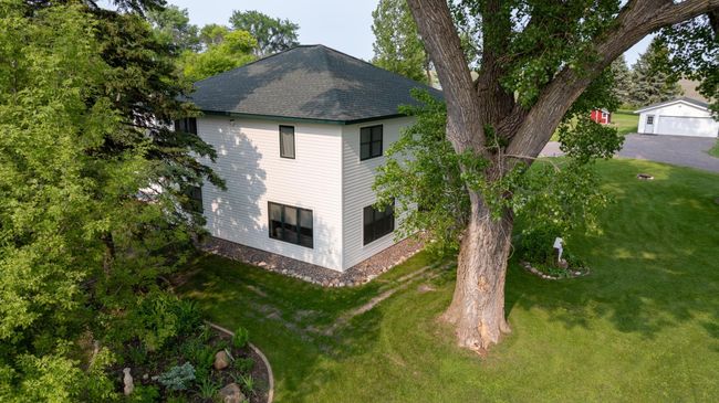 Landscape around the house shows ample drainage and thought out design space | Image 51