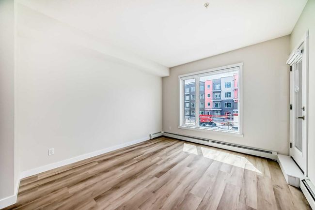 212 - 660 Shawnee Square Sw, Condo with 2 bedrooms, 2 bathrooms and 1 parking in Calgary AB | Image 11