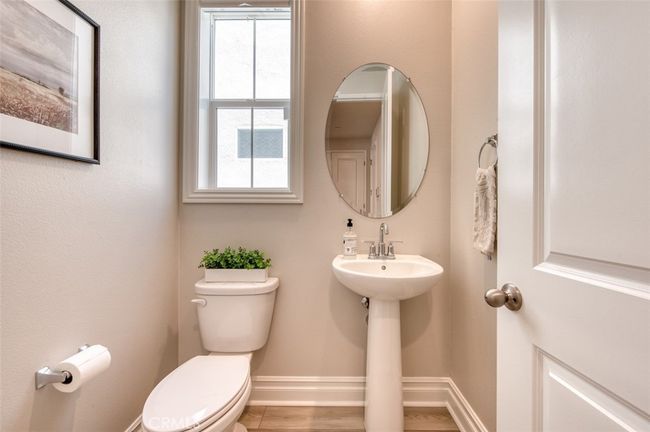 Downstairs powder room. | Image 10