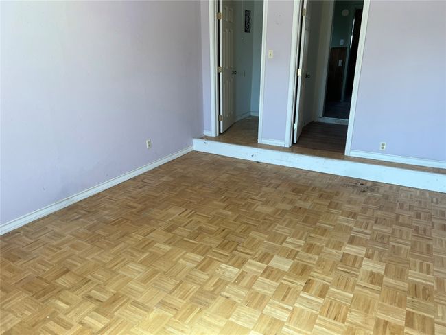 Spare room featuring baseboards | Image 5