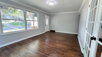 Entryway with french doors, ornamental molding, and dark hardwood / wood-style floors | Image 2