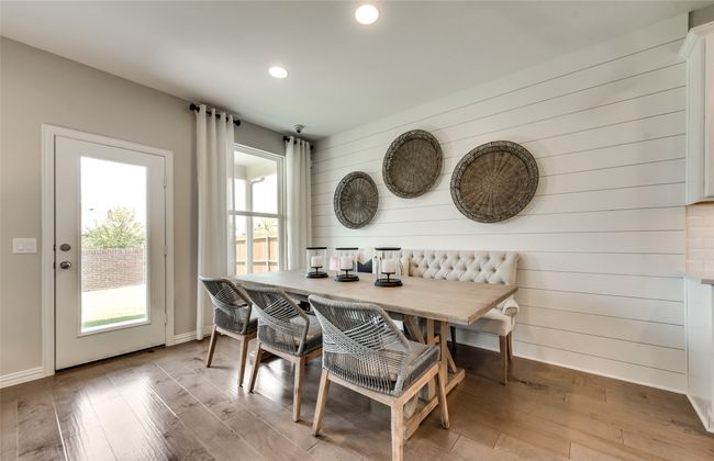 Airy dining room *Photos of furnished model. Not actual home. Representative of floor plan. Some options and features may vary | Image 8
