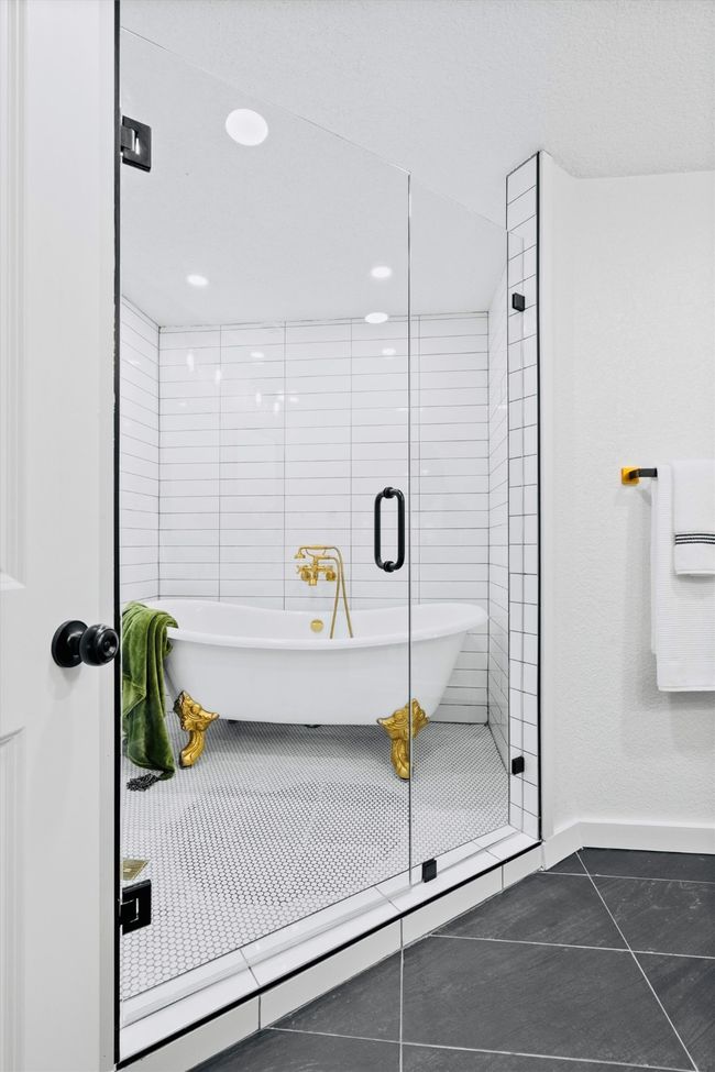 Full bath with a soaking tub, tile patterned flooring, recessed lighting, and a shower stall | Image 21