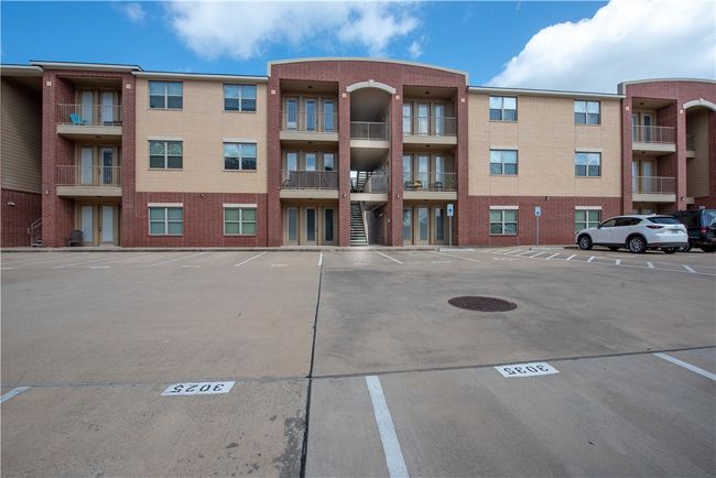 View of property with uncovered parking | Image 18
