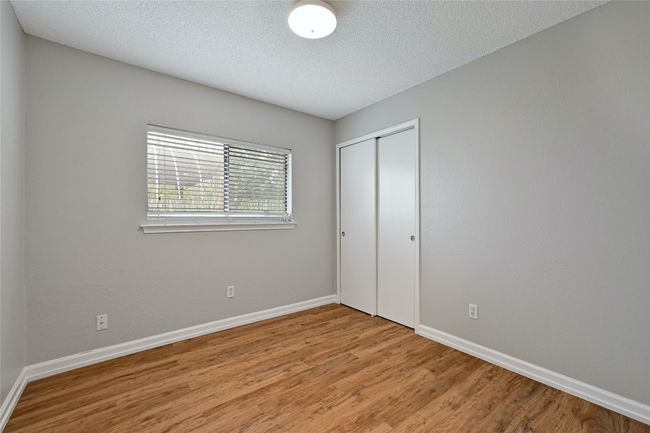This is one of the two secondary bedrooms. | Image 19