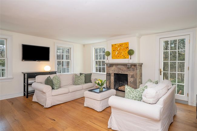Living Room with Fireplace, wide board oak floors doors to flag stone patio | Image 4