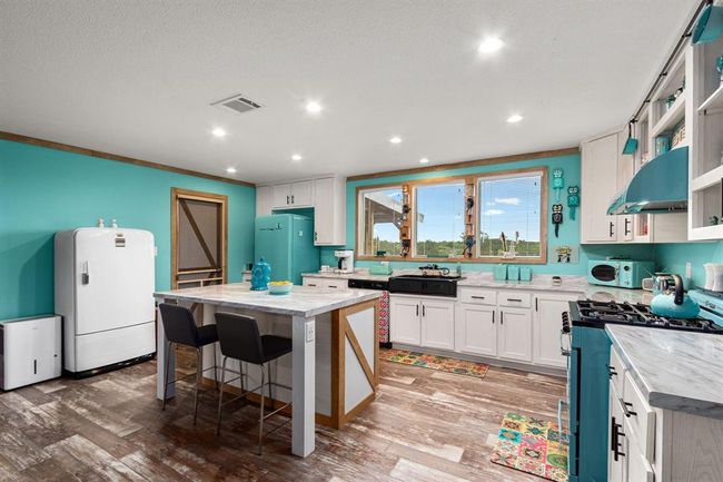 1411 Vogelsang Rd, Home with 3 bedrooms, 2 bathrooms and 3 parking in Columbus TX | Image 8