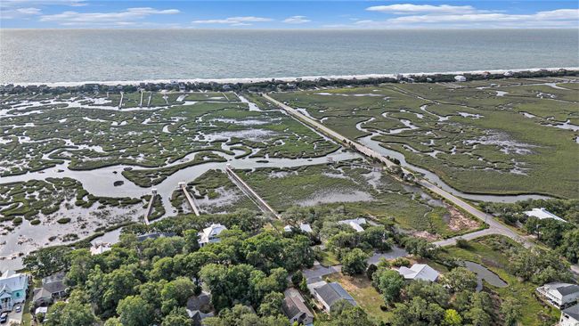 Aerial view of property and surrounding area featuring a nearby body of water | Image 17
