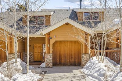 View of front facade featuring a one car garage | Image 1