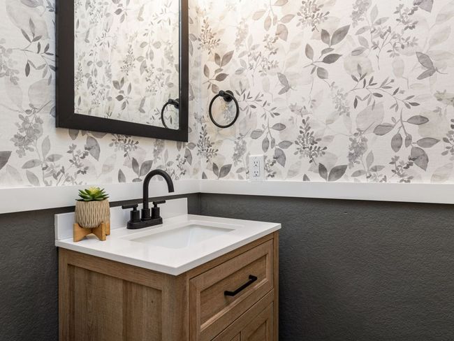 Bathroom featuring vanity and wallpapered walls | Image 16