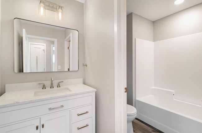 Upper Level Guest Full Bath with Door to separate Vanity from Toilet/Shower. | Image 16